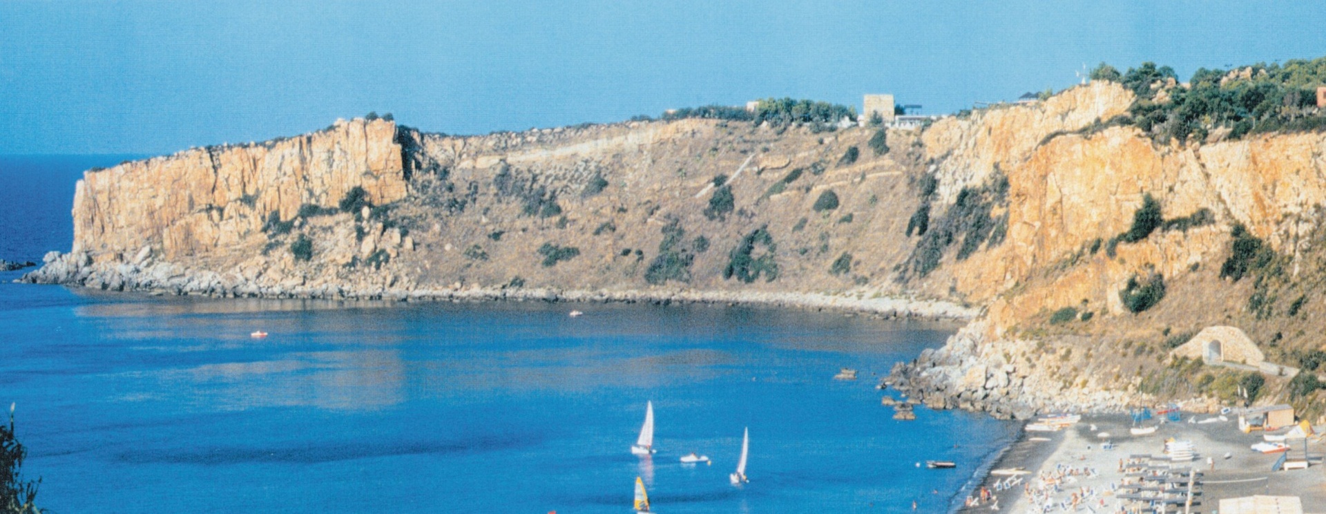 Coastal cliffs and bay used for sedimentary geology field excursions