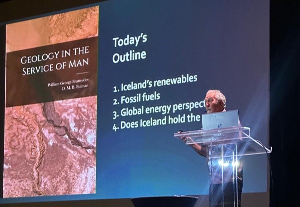 Dorrik Stow speaking on energy, fossil fuels and Iceland's renewables, with 'Geology in the Service of Man' projected
